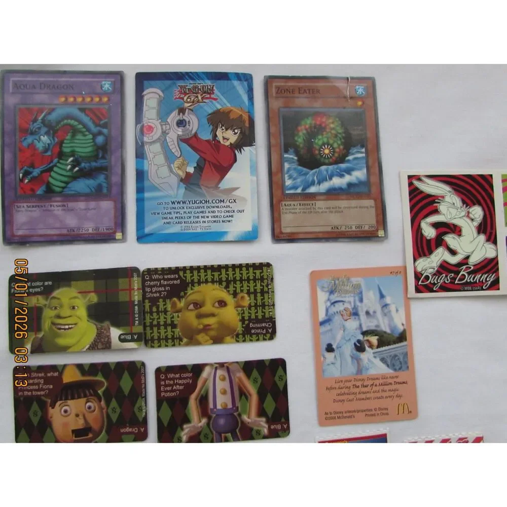 Vintage Yu-Gi-Oh cards, Shrek cards, Crackerjack cards, Bugs Bunny, Taz stickers